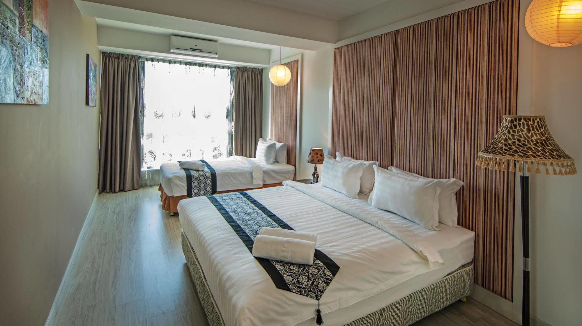 Borneo Vista Suites Hotel Кота-Кинабалу Экстерьер фото